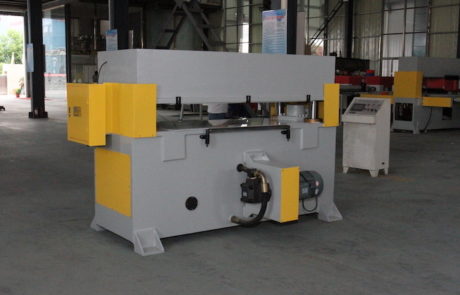 Four column cutting machine for leather cutting